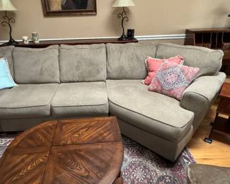 #23 - $450 - Wrap around Sage sofa Ahsley furniture 12'6"x8'7"x33H