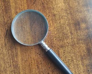 Vintage Magnifying Glass with Black Handle and Ribbed Ferrule