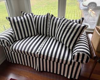 Black and White Striped Skirted Sofa with Toss Pillows