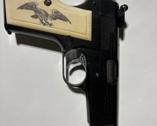 Browning HiPower SemiAutomatic Pistol with Engraved Ivory Grips