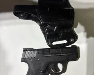 Smith  Wesson MP Shield EZ . Super Carry SemiAutomatic Pistol with Leather Holster