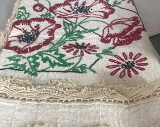 Embroidered and crocheted farmhouse tablecloth