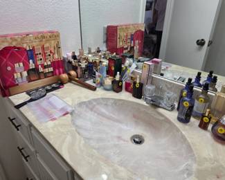 Lots of Estee Lauder cosmetics