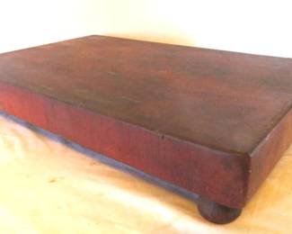 solid dark wood cutting board