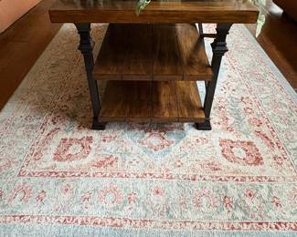 Industrial Style Wood and Metal Coffee Table with Turned Legs and Crisscross Bracing