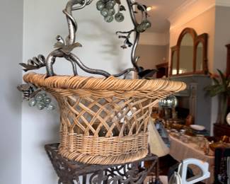 This heavy basket has iron grape design