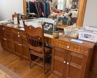 This is a nest of cabinets converted to a large sewing station!  We have lots of material, sewing nick nacs, and patterns