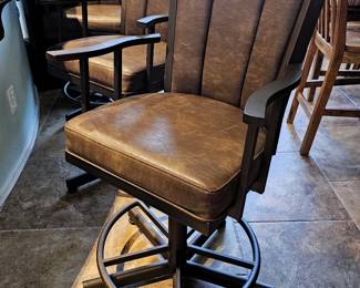 Swiveling barstool chairs