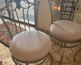 Two Silver Toned Cushioned Bar Stools