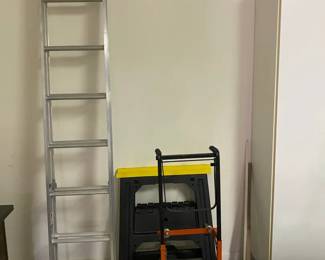 Sixteen Foot Extension Ladder, Dolly, And Two Saw Horses
