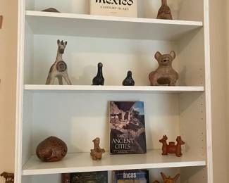 Four Shelves Of Decor And Knowledge