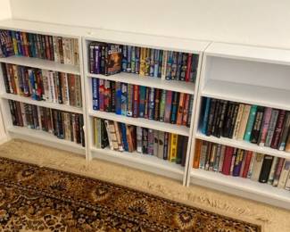 Three Bookcases And Books