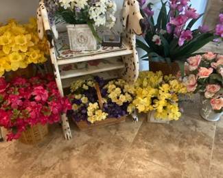 Lots Of Faux Flowers And A Wood Dalmatian Plant Stand