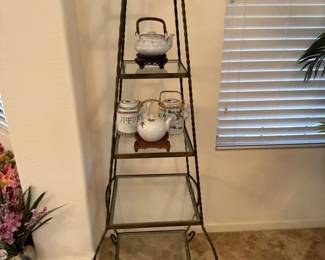 Wrought Iron Shelf With Some Decor