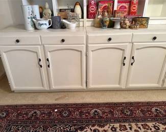Two Cabinets With Doors And Drawers