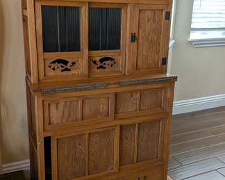 This piece is a Mizuya Tansu (Japanese kitchen cabinet). Traditionally, these were the heart of a Japanese kitchen, used to store ceramics, utensils, and food. 