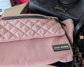 Steve Madden Bjodie crossbody bag in a pink quilted nylon fabric. 