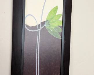 oil painting on canvas by artist Alan Buckle featuring a green lotus flower, framed in a dark wood finish. 