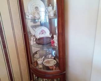 Corner Curio lighted display cabinet.