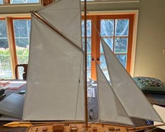 Model Sailboat with White Sails