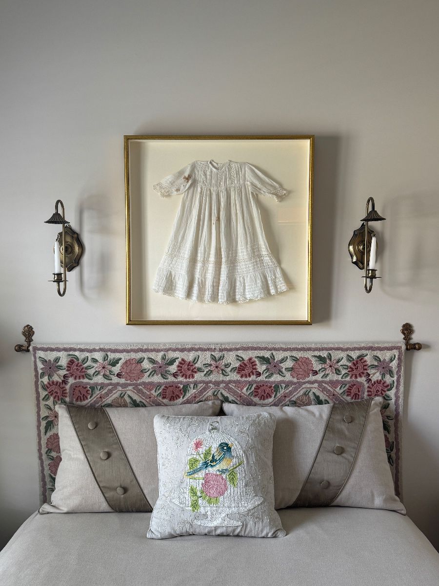 Headboard is a tapestry attached to a rod on wall