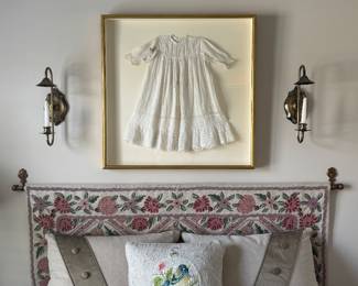 Headboard is a tapestry attached to a rod on wall