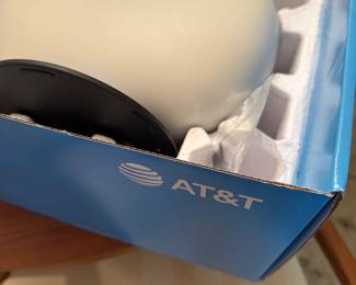 The item in the image is an AT&T All-Fi Hub (model CGW450-400), which is a 5G LTE internet gateway and WiFi router.  Function: Provides home Wi-Fi using AT&T's 5G wireless network.  Features: Includes internal U.FL ports for connecting external MIMO antennas to improve data rates. 