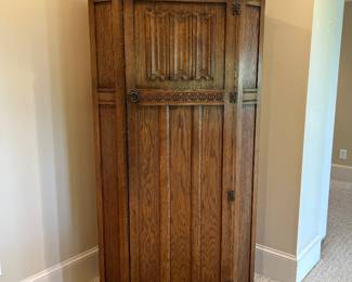 Vintage Corner wood cabinet with paneled door and interior storage