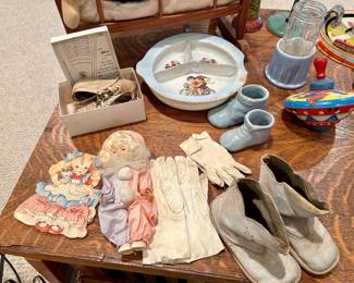 Vintage baby shoes, nursery dish set, doll, gloves and tin toys