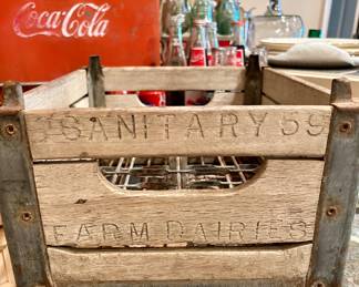 Vintage wooden milk crate marked “Sanitary 55 Farm Dairies” with original wire insert – great rustic décor or storage piece