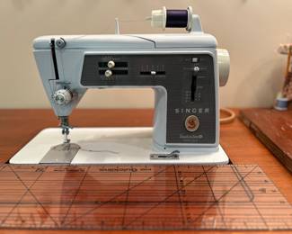 Vintage sewing setup – Singer machine in wooden desk