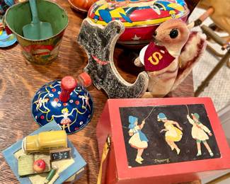 Vintage tin spinning toys, music box and collectible toys