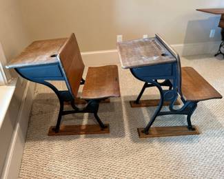 Pair of vintage child’s school desks with wood seats and metal frames