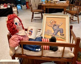 Raggedy Ann doll, vintage child’s cradle, nursery decor and baby items