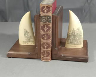 Lot 290: Whale Tooth Scrimshaw Bookends & Origin of Species