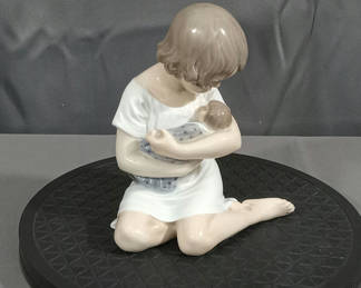 Lot 273: Royal Copenhagen Girl w/Doll Figurine