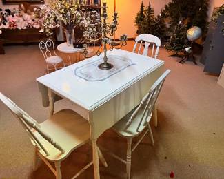 Drop leaf table with three chairs