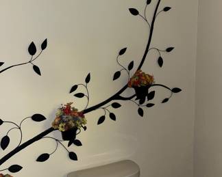Right side of metal tree with flower pots