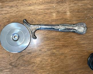 Silver pizza cutter