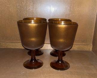 Set of plastic brown wine glasses