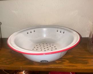 Red and white porcelain colander