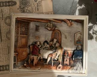 Pair of plaster wall hangings