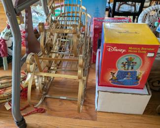 Disney birthday water globe, gold-tone sleds, & misc