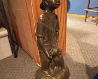 Bronze Sculpture of a Boy with a Dog