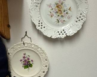 Decorative Porcelain Plates with Floral Motifs and Lattice Edges