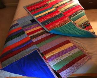 $30 each lap quilt  about 54L  x  38W  - quilts are newly made from scraps of clothes the Quilter made for her twin girls