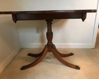 mahogany game table with top fully open to double table top