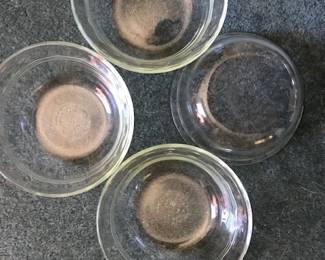 $5    four small Pyrex bowls with stripes and fluted edge