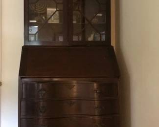 $140 mahogany secretary with ball and claw feet  79H  x  33W  x 21D to the bow front