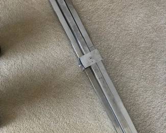 Alivar (?) glass top dining table legs fold into one tidy unit